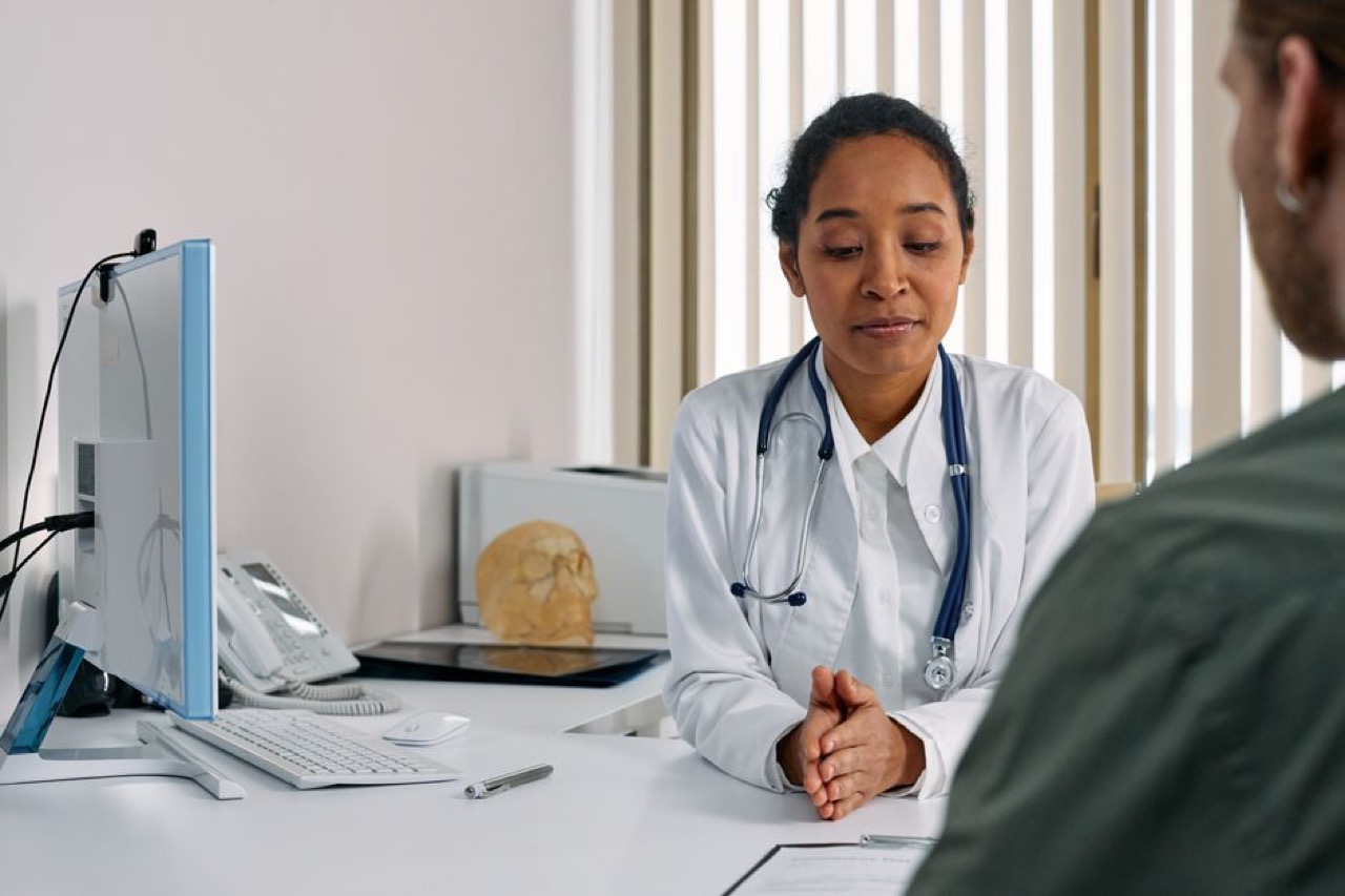 Medical aid for pregnancy in South Africa Doctor with patient consultation